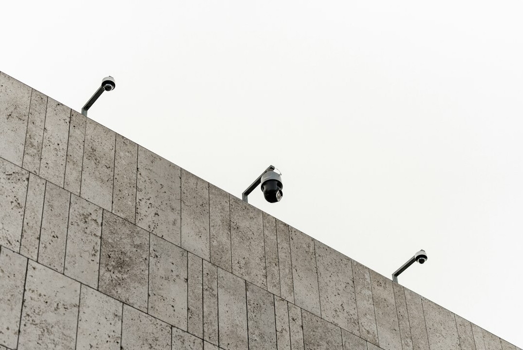 person checking security cameras